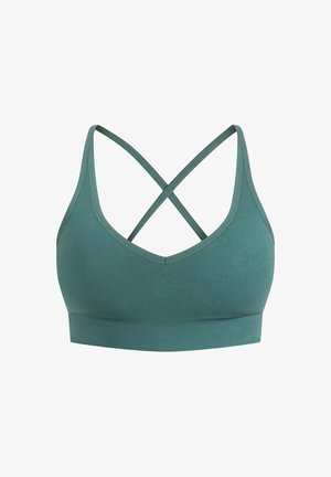 Naadloze sportbh in gedimd groen. Kenmerkt een V-hals, brede onderband en gekruiste bandjes op de rug. Zachte, rekbare stof.