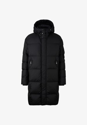 Zwarte donsjas met capuchon, met gewatteerd ontwerp, zakken met rits aan de voorkant en een rechte silhouet. Zachte stof met een gladde afwerking.