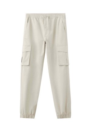 Pantalon cargo beige clair avec taille et poignets élastiques, avec poches latérales à rabat et poches fendues à l'avant.