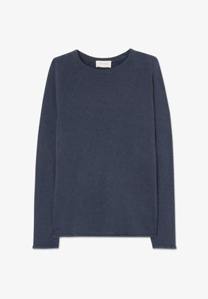 Tumesinine pikkade varrukatega särk pehmest kangast, ümmarguse kaeluse, raglaani varrukate ja sirge alläärega, millel on külgmised lõhed.