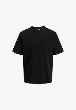 Must segu T-särk lühikeste varrukatega, ümmarguse kaelusega ja lõdva lõikega. Asetatud on väike brändi silt alumises servas.