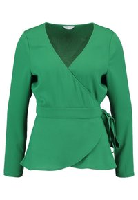 Grüne Wickelbluse aus glattem Stoff, mit langen Ärmeln, tiefem V-Ausschnitt, Bindegürtel in der Taille und abgerundetem Saum.