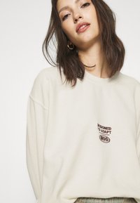 BDG Urban Outfitters SPHERE - Camisola - ecru