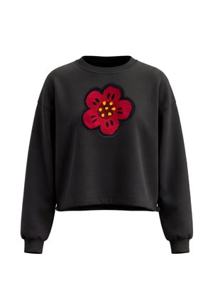 Sort kort sweatshirt med lange ærmer med ribbet manchetter og en stor rød blomst med gule prikker broderet på fronten i midten.