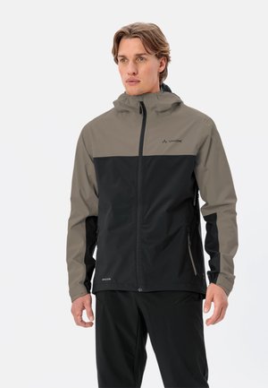 Giacca da uomo, impermeabile, con design bicolore: parte superiore grigio chiaro e parte inferiore nera. Tasche con zip, cappuccio regolabile.
