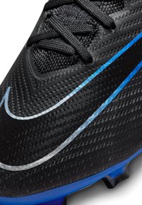 Black football boot with textured upper, black laces, silver and blue accents, and a blue sole. Features a streamlined shape for performance.