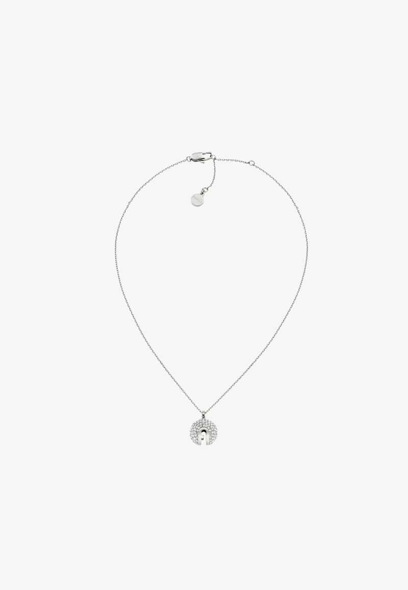 Sølv halskæde med en tynd kæde og en rund vedhæng med udskåret design, prydet med små klare krystaller for ekstra detaljer.