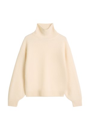 Kremowy sweter z golfem wykonany z prążkowanej dzianiny. Posiada długie, lekko bufiaste rękawy oraz luźny krój.
