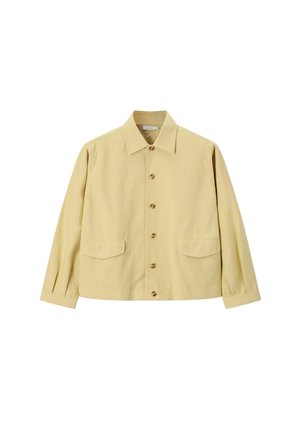 Veste beige clair à boutons, avec col et deux poches avant à rabat, manches longues et ourlet droit.