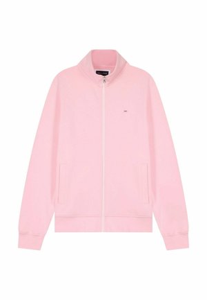 Veste zippée rose clair avec col montant, deux poches latérales, poignets côtelés, et petit logo brodé sur la poitrine.