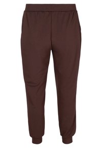 Braune, taillierte Jogginghosen aus weichem Stoff. Verfügt über einen elastischen Bund und Bündchen an den Knöcheln. Keine Taschen oder sichtbare Hardware.