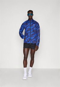ASICS ROAD LITE-SHOW PACKABLE JACKET - Giacca a vento - black