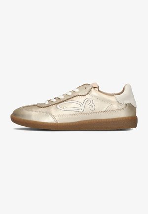 Gold leather sneaker with a rounded toe, white accents, and a rubber sole. Features a decorative design along the side and laces.