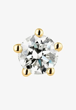 Gema redonda y transparente engastada en seis garras de oro. El diseño presenta acentos suaves y redondeados distribuidos uniformemente alrededor de la piedra.
