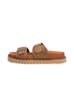 Brown suede slide sandals with two buckled straps, a tan rubber outsole, and a textured tread for grip. Classic open-toe design.