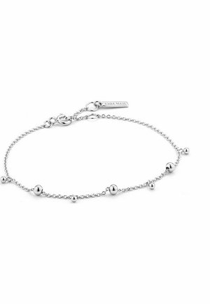 Zilveren armband met een delicaate ketting met ronde kralen in verschillende groottes en een sluiting versierd met een merklabel.