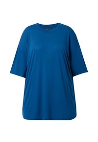 T-shirt corto, a maniche corte e dal taglio morbido, di colore blu uniforme. Realizzato in tessuto liscio e leggero, con scollatura rotonda e silhouette rilassata.