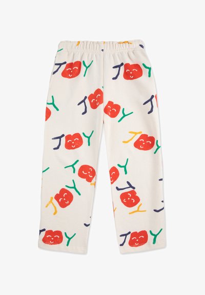 Cotton pajama pants with an elastic waistband; off-white background featuring red smiley faces, green and yellow letters spelling "JOY," and colorful accents.