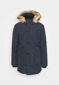 Granatowa kurtka parka z futrzanym obszyciem kaptura, zapięciem na guziki, dwoma przednimi kieszeniami oraz teksturowaną tkaniną.