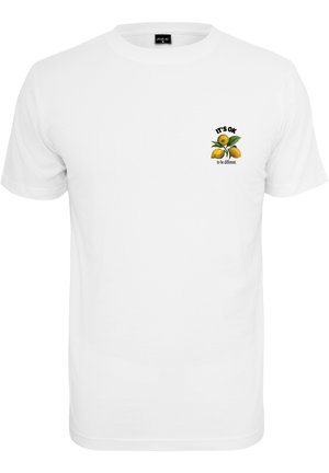 Hvid bomulds T-shirt med et frontgrafik af citroner og teksten: "DET ER OK at være anderledes." Klassisk rund hals og korte ærmer.