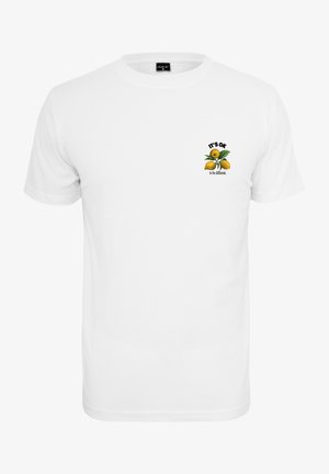 T-shirt en coton blanc avec un graphique de citrons à l'avant et le texte : "C'EST BIEN d'être différent." Encolure classique et manches courtes.