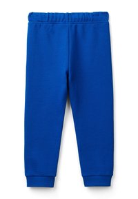Pantaloni della tuta blu in cotone con vita elasticizzata, gambali affusolati e polsini a costine, caratterizzati da una superficie liscia e senza motivi visibili.