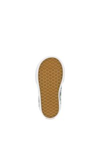 Suela de zapato de goma con un patrón de diamante. Bisel exterior blanco y parte inferior de color goma. Forma redondeada con acentos en el perfil lateral.