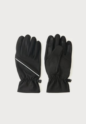 Paire de gants isolants noirs avec poignets élastiques, prise texturée sur les doigts et une petite bande diagonale blanche au dos d’un gant.