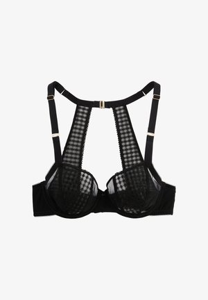 Soutien-gorge noir en dentelle avec bonnets à armatures, bretelles réglables et un panneau vertical décoratif au dos avec fermeture à agrafe dorée.