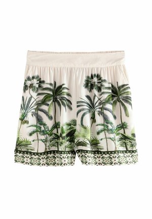 Shorts beige clair ornés d'imprimés de palmiers tropicaux en vert. Taille élastique et bord décoratif à motifs en bas. Matière en coton.