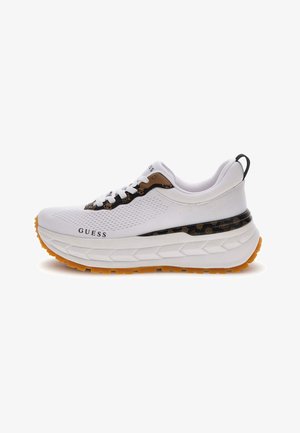 White athletic shoe with mesh and synthetic materials, brown accent, black detailing, prominent orange sole, and patterned midsole.