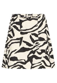 Jupe trapèze rayée zèbre en noir et blanc avec une ceinture élastique et des poches plaquées à l'avant, longueur au-dessus du genou.