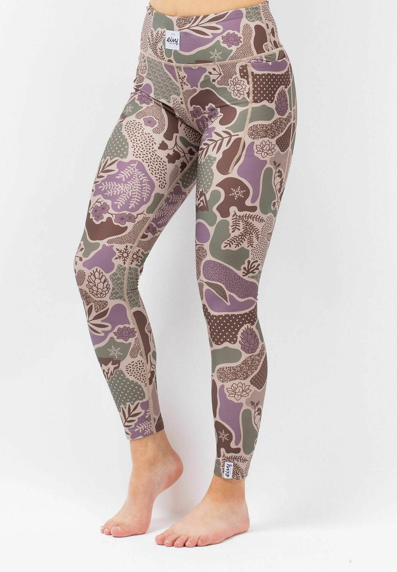 Leggings in a multi-colored design featuring purple, green, and brown patterns with floral and abstract shapes. Made with stretchy fabric.