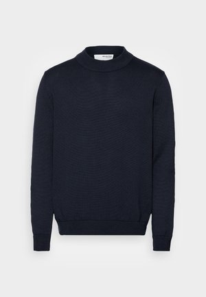 Maglione a collo alto di colore blu navy, con maniche lunghe e polsini a coste. Realizzato in un tessuto a maglia testurizzato. Design semplice a tinta unita.