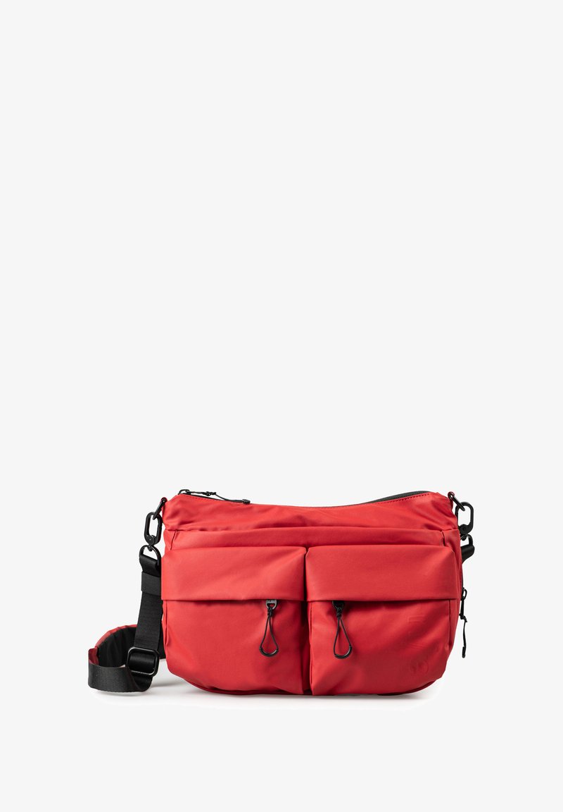 Red nylon bag with two front pockets, zip closure, adjustable strap, and black hardware accents. Smooth texture and rounded shape.
