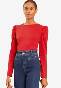 Unselected, red puff sleeve