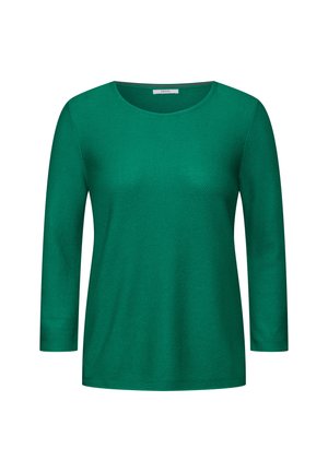 Zielona bluzka z długim rękawem i okrągłym dekoltem, wykonana z fakturowanej tkaniny, o luźnym kroju i minimalistycznym designie.