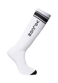 Witte kniekousen met ribbelstructuur, zwarte accentstrepen bovenaan en zwarte teen. Heeft de tekst "zanroc" aan de zijkant.