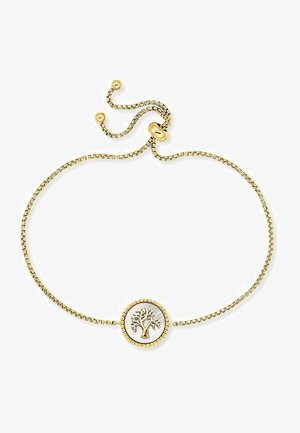 Guldring med et dekorativt træemblem i en cirkulær vedhæng. Justerbar lukning med små perler langs en fin kæde.