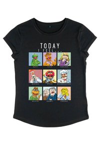 Černé tričko s devíti obličeji postaviček Muppetů v barevných čtvercích a textem "DNES SE CÍTÍM..." nahoře, zobrazující různé emoce.