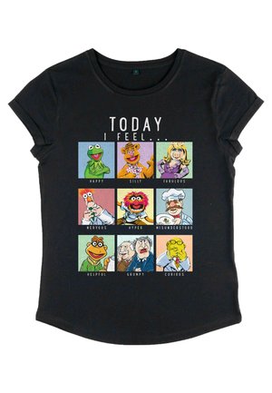 Maglietta nera con nove volti di personaggi Muppet all'interno di quadrati colorati e il testo "OGGI MI SENTO..." sopra, che mostra varie emozioni.