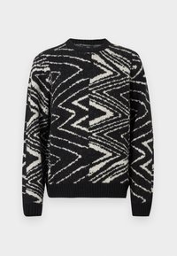 Schwarzer und weißer gestrickter Pullover mit abstrakten Zickzack- und geometrischen Mustern, Rundhalsausschnitt, langen Ärmeln sowie gerippten Bündchen und Saum.