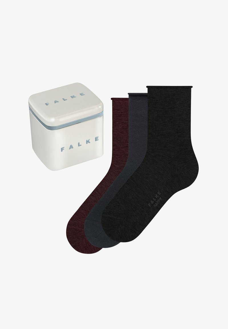 Falke sokken in bordeauxrood, donkergrijs en zwart, tentoongesteld met een witte, vierkante blikken container met blauwe accenten en logo.