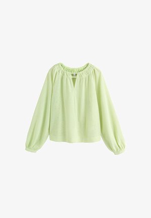 Világoszöld hosszú ujjú blúz, összegyűrt rugalmas nyakkivágással és mandzsettával, kis V-alakú elülső kulcslyuknyílással.