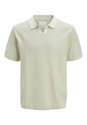 Rövid ujjú pólóing világos krém színben, texturált kötött anyagból, V-nyakú dizájnnal, bordás mandzsettákkal és szegéllyel.