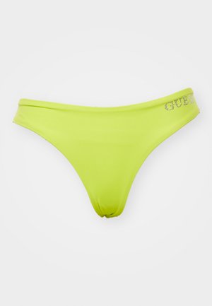 Neon grønn bikini-bunn, laget av glatt stoff. Har et lavt livdesign med en samlet tekstur og "GUESS"-logo pyntet med rhinestones.