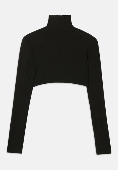 Svart kortermet langermet topp med høy hals. Laget av elastisk stoff, har en glidelås bak og sidespalter.