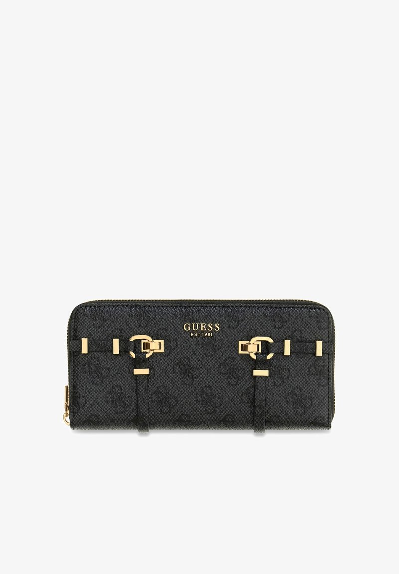 Portefeuille à fermeture éclair Guess noir avec boucles dorées, motif imprimé du logo et texte doré "GUESS EST 1981" sur le devant.