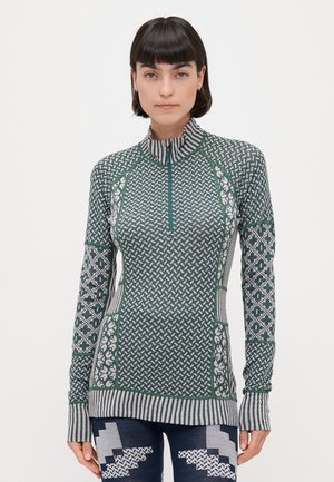 Grønn mønstret langermet genser med halv-glidelås krage. Har teksturerte design, tettsittende fasong og stripete mansjetter.