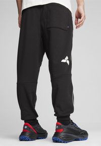 Puma Trainingsbroek - black